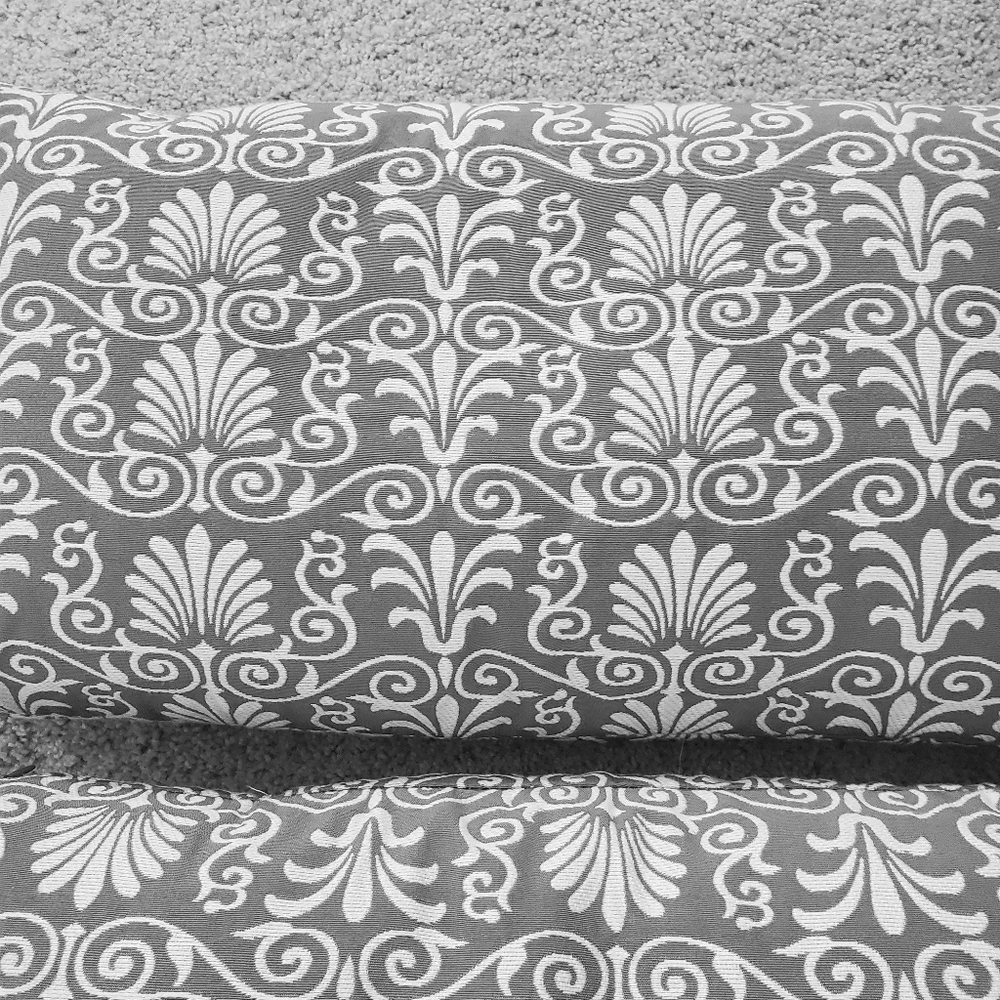 (2) gray and white decorative pillows